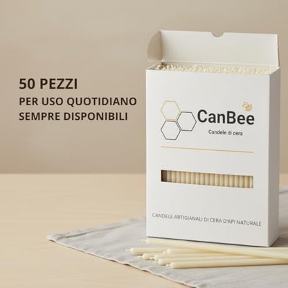 Confezione CanBee con candele sottili bianche su un tavolo chiaro, con testo «50 pezzi per uso quotidiano»